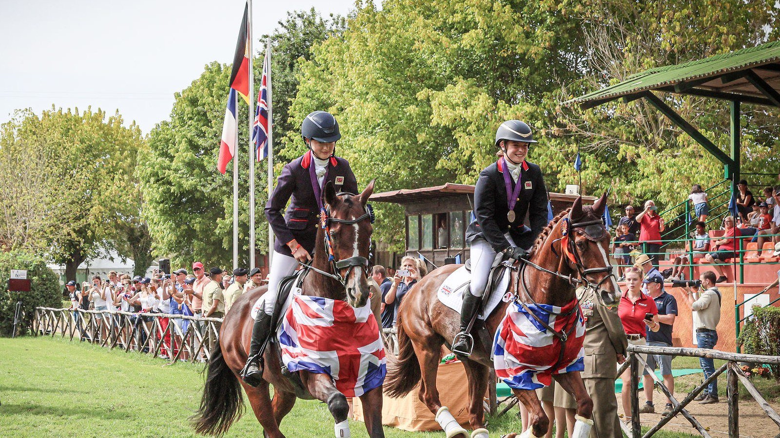 GB team lap of honour — horses in Union Jack rugs